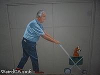 Man with Alien in Stroller
